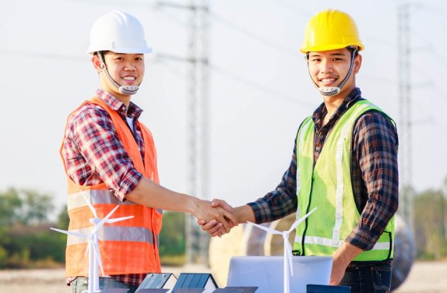 two-engineers-shaking-hands-in-construction-site-a-2022-07-01-06-03-43-utc-e1665528042728.jpg